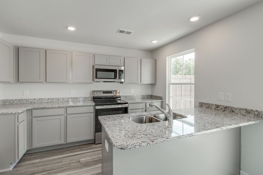Furnished interior view inside a new home in Padgett Commons, Hopkins (Image 7).