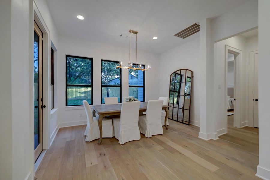 Breakfast area is large enough to accommodate a dining room table*photos are of a previously constructed home by the builder. 1527 Hewitt may have different selections at builders sole discretion. These photos are not meant to be an exact representation of 1527 Hewitt.