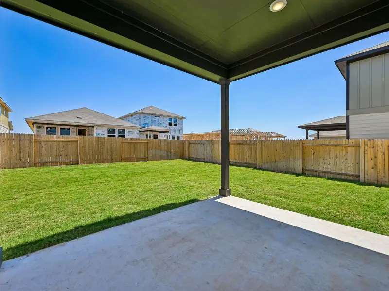 Exterior details and patio area of a home in Travena - Americana Collection, Georgetown (Image 2). Exterior details and patio area of a home in Travena - Americana Collection, Georgetown (Image 2).