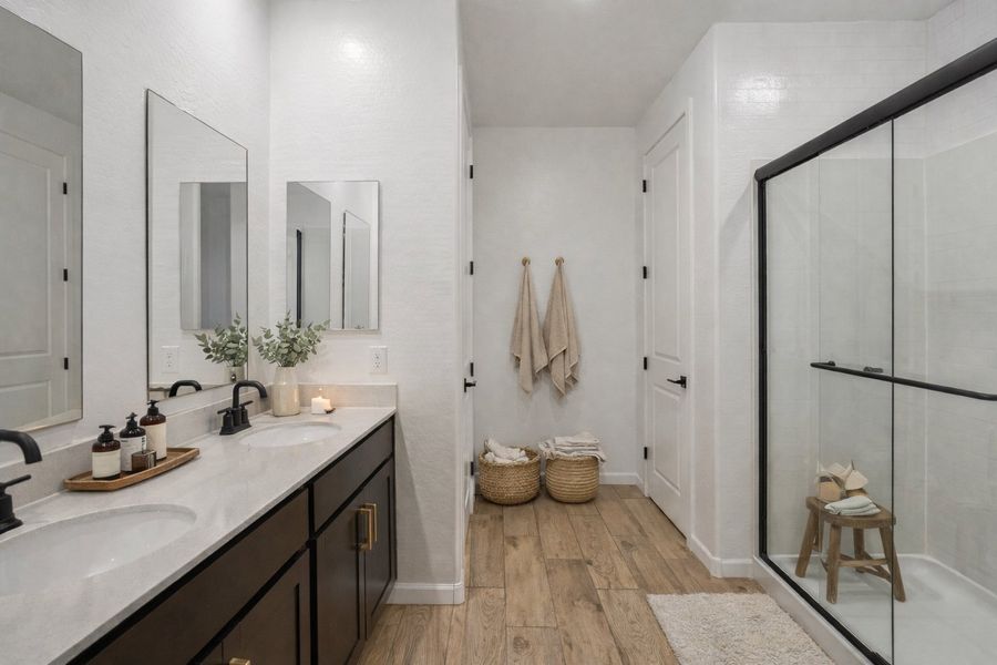 Primary bath. Virtually staged. Finishes may vary by community.