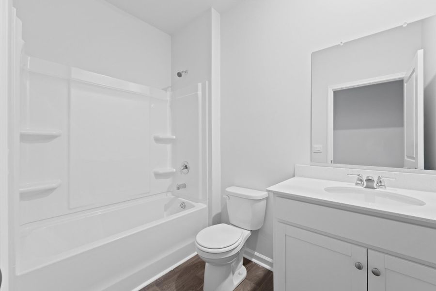 Furnished interior view inside a new home in Pine Hills at Cane Bay, Summerville (Image 11).