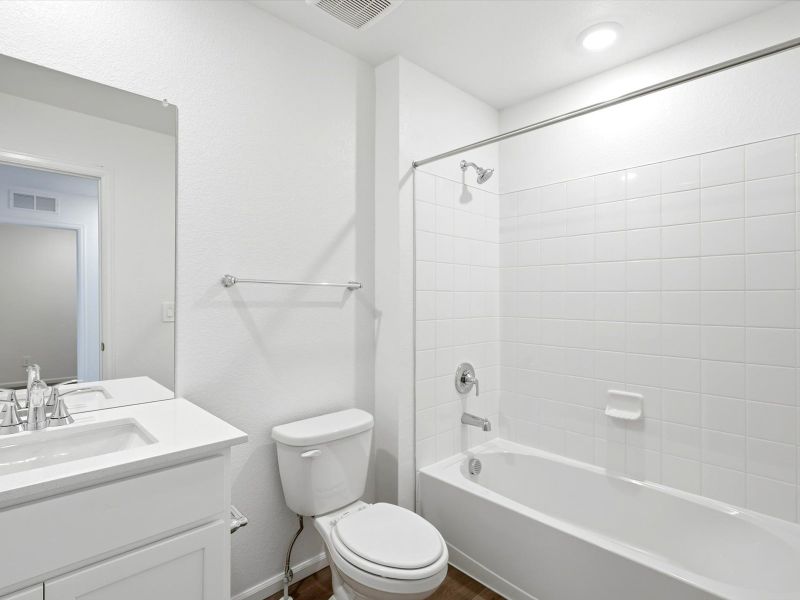 Furnished interior view inside a new home in Skyview at High Point, Aurora (Image 8).