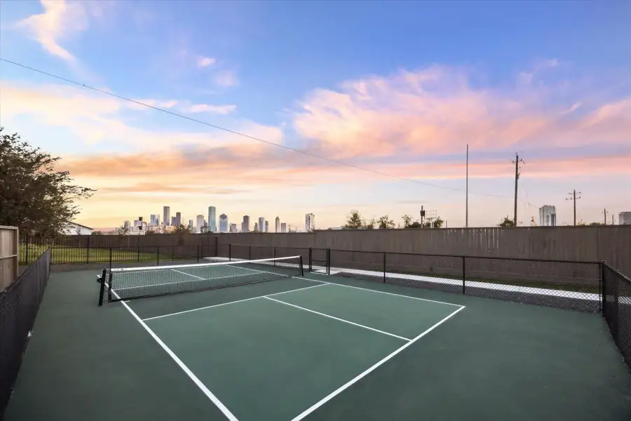 Community amenity featuring pickleball court and open skyline views. Community amenity featuring pickleball court and open skyline views.