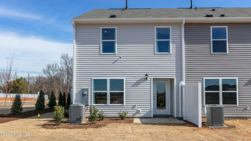 Exterior details and patio area of a home in The Townes at Ridgewood Farms, Winterville (Image 3).