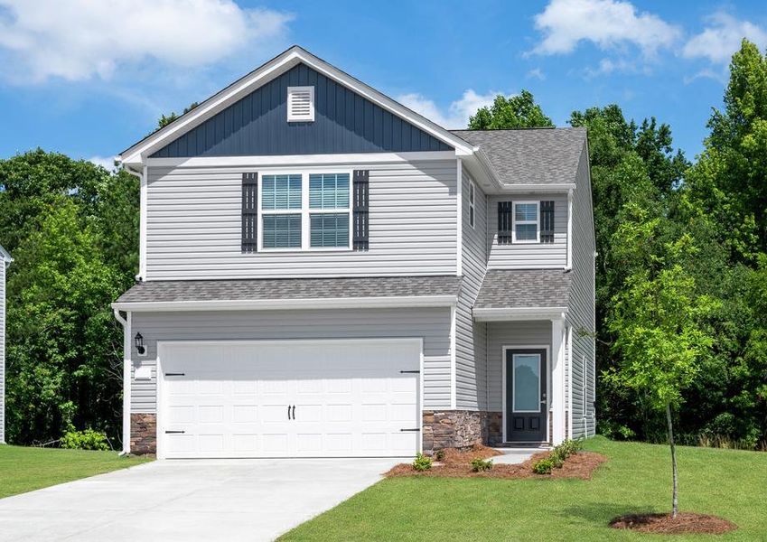 This home has a spacious two-car garage and covered front porch. This home has a spacious two-car garage and covered front porch.
