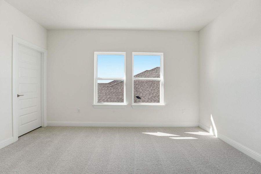 Spare room with light carpet