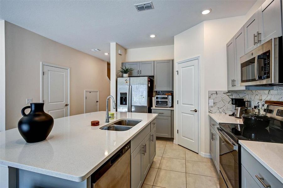 Furnished interior view inside a new home in , Kissimmee (Image 10). Furnished interior view inside a new home in , Kissimmee (Image 10).