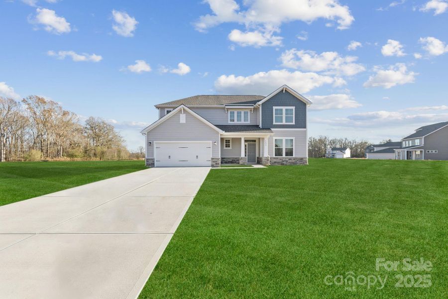 Front exterior of a new home in Stonemill, Monroe, NC, highlighting curb appeal (Image 5).