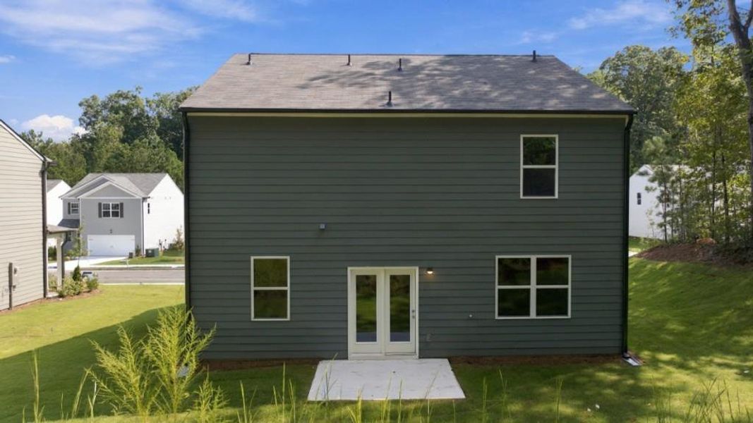 Exterior details and patio area of a home in Oaks at Cedar Grove, Fairburn (Image 3).