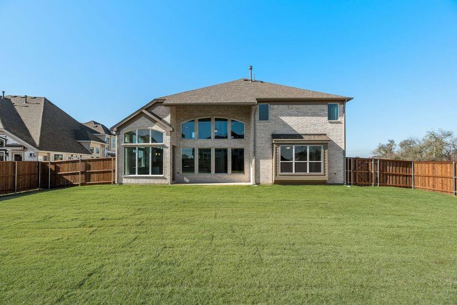 Exterior details and patio area of a home in Dominion of Pleasant Valley, Wylie (Image 4).