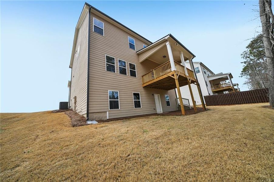 Exterior details and patio area of a home in Rosewood Lake Estates, Hoschton (Image 3).