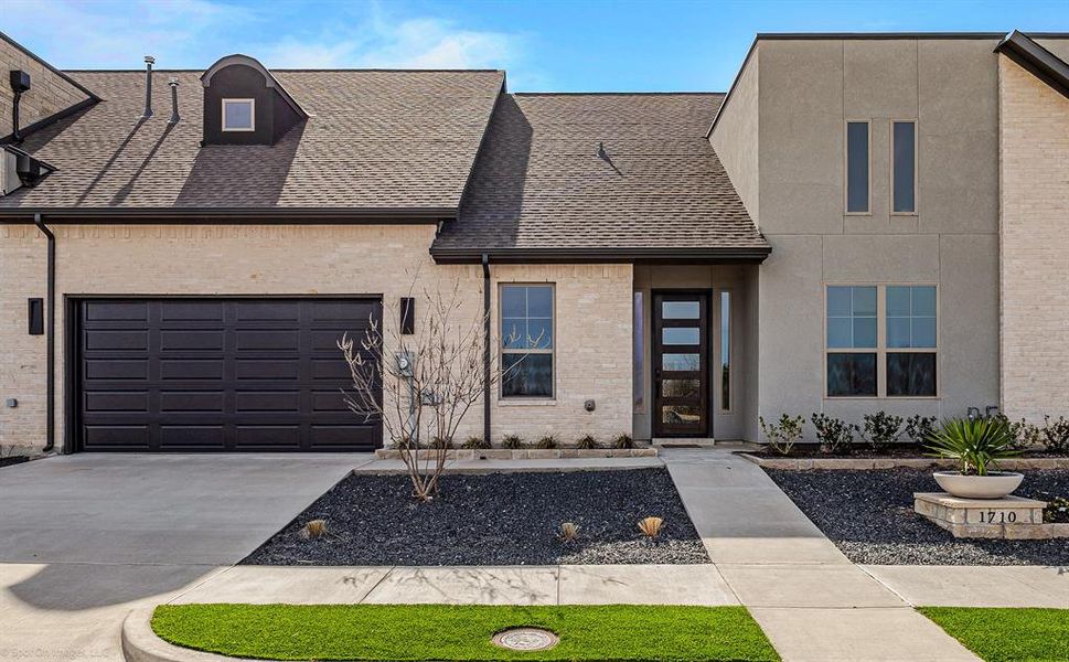 Front exterior of a new home in , Heath, TX, highlighting curb appeal (Image 23). Front exterior of a new home in , Heath, TX, highlighting curb appeal (Image 23).