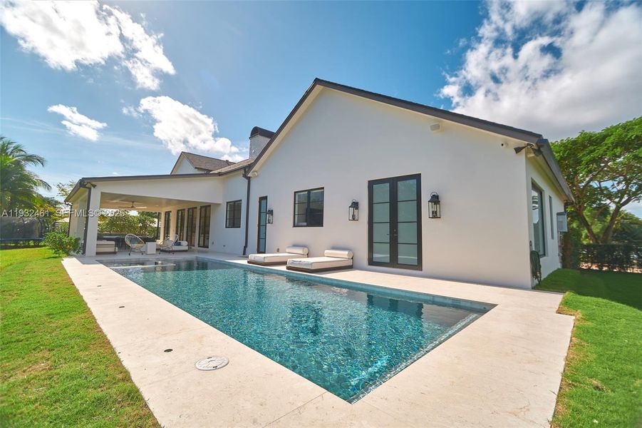 Exterior details and patio area of a home in , Pinecrest (Image 7). Exterior details and patio area of a home in , Pinecrest (Image 7).