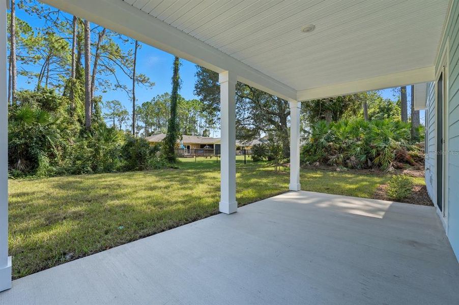 Exterior details and patio area of a home in Palm Coast Homes, Palm Coast (Image 22).