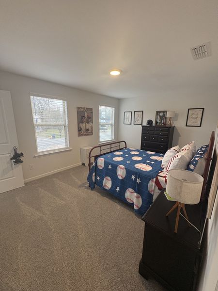 Photo is of the model home to show what the completed floor plan looks like. Selections and Options may vary.