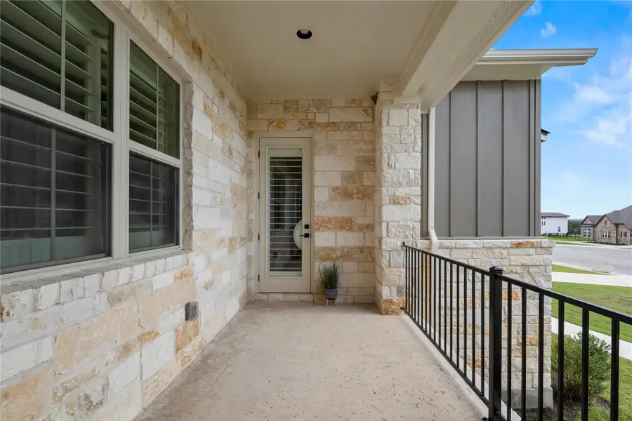 A welcoming covered balcony entrance directly to or from guest suite A welcoming covered balcony entrance directly to or from guest suite