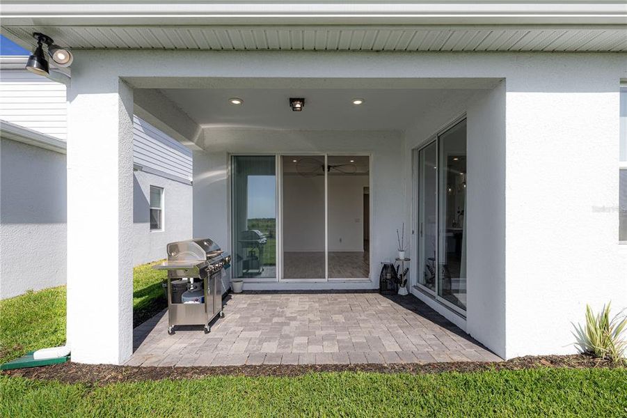 Exterior details and patio area of a home in EverBe, Orlando (Image 30).