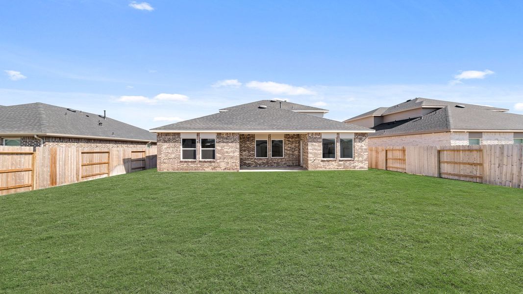 Exterior details and patio area of a home in Sunterra, Katy (Image 3).