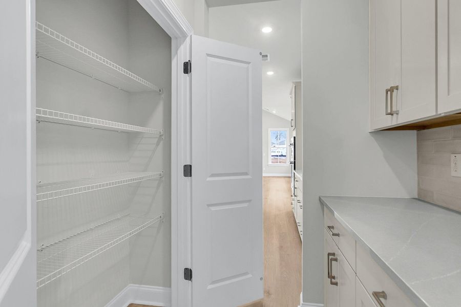 Furnished interior view inside a new home in Tidewater at Lakes of Cane Bay, Summerville (Image 5).