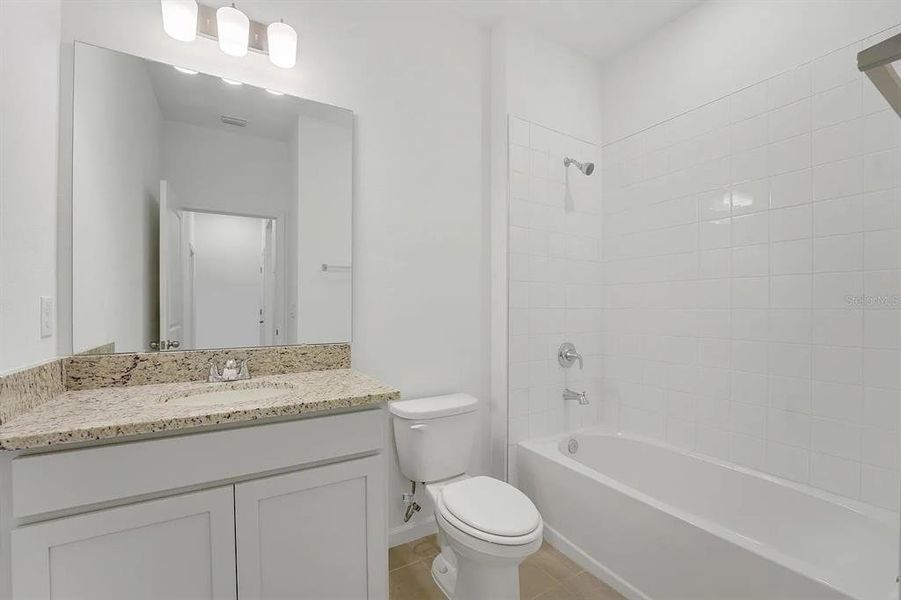Furnished interior view inside a new home in Cypress Park Estates, Haines City (Image 9).