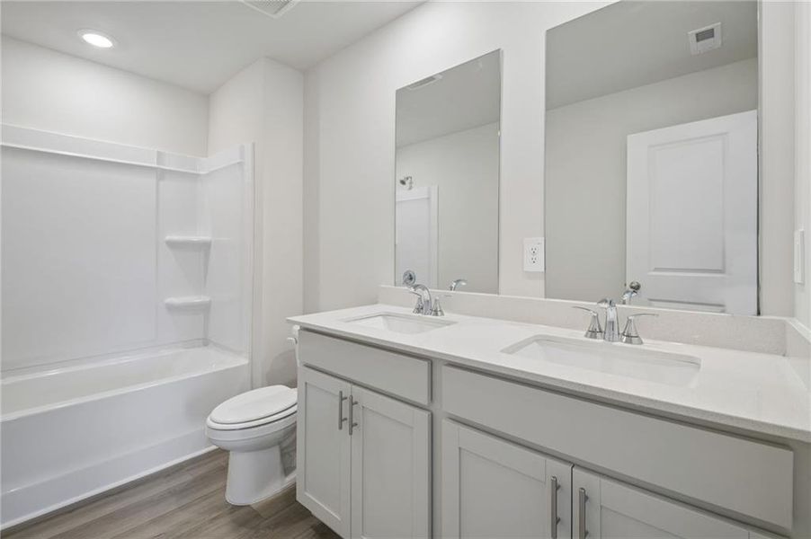 Furnished interior view inside a new home in Northwoods at Mirror Lake, Villa Rica (Image 14).