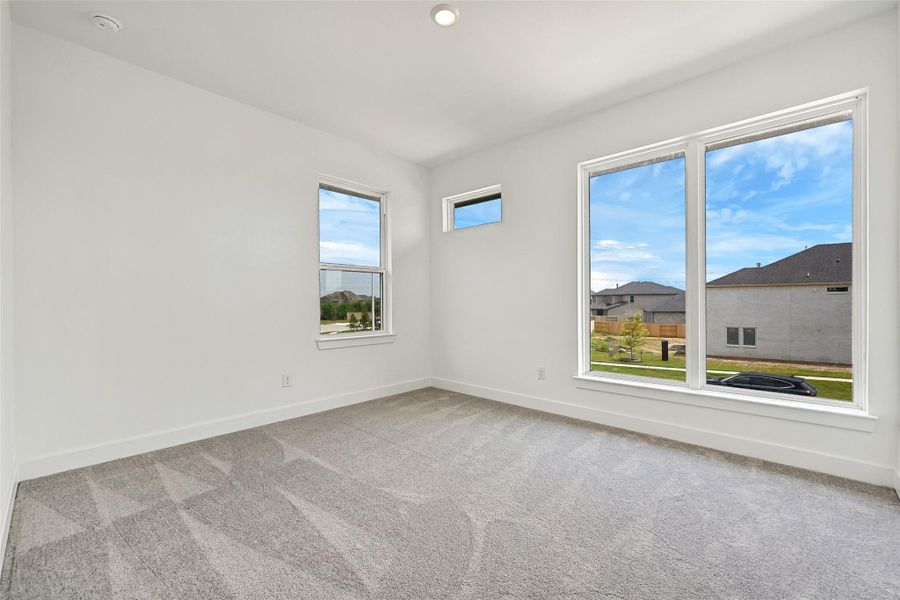 Spacious, unfurnished interior of a new home in Avalon at Friendswood, Friendswood (Image 39).