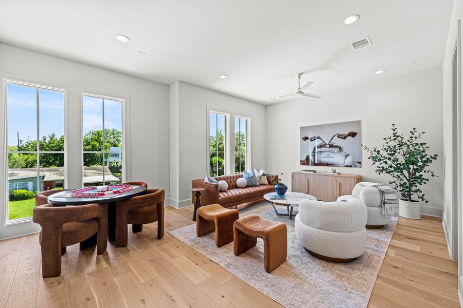 The game room is at the top of the stairs with ample space to provide layout flexibility The game room is at the top of the stairs with ample space to provide layout flexibility