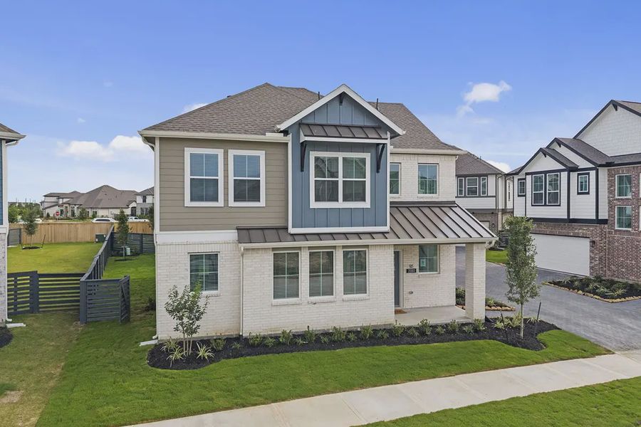 Front exterior of a new home in Bridgeland Courtyard, Cypress, TX, highlighting curb appeal (Image 17).