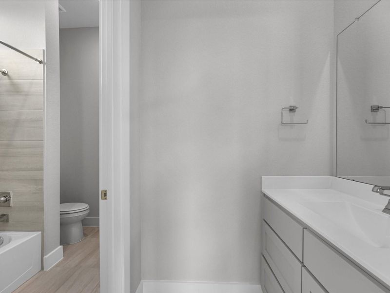 Furnished interior view inside a new home in Harvest Green, Richmond (Image 10).