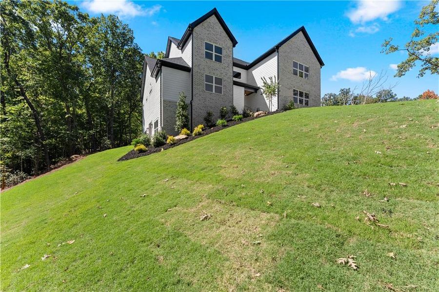 Front exterior of a new home in , Baldwin, GA, highlighting curb appeal (Image 30).