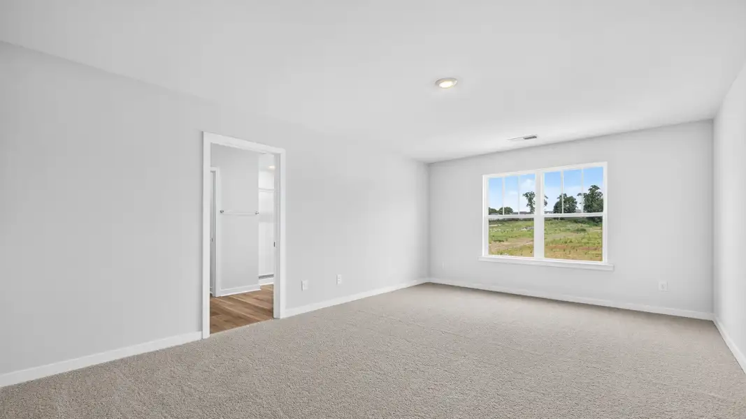 Spacious, unfurnished interior of a new home in Reedy Creek Preserve, Charlotte (Image 17).