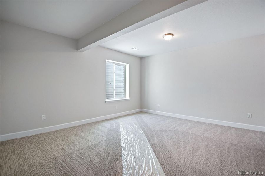 Spacious, unfurnished interior of a new home in Ensemble at The Aurora Highlands, Aurora (Image 28).