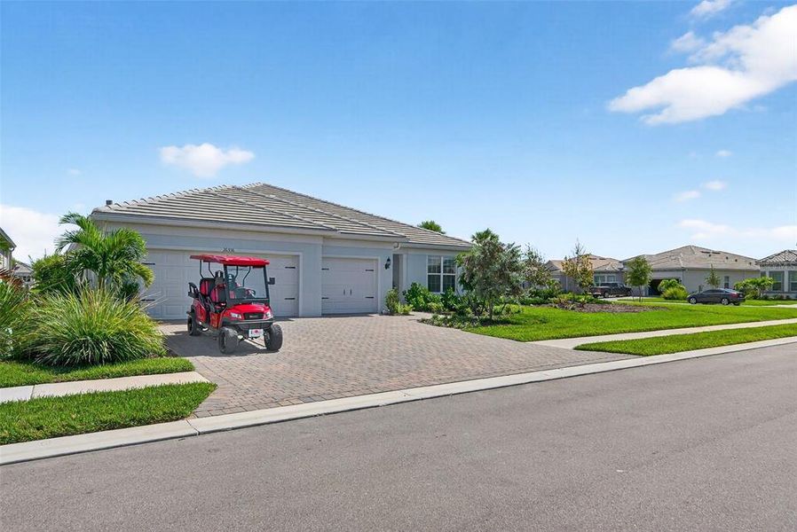 Front exterior of a new home in , Englewood, FL, highlighting curb appeal (Image 30). Front exterior of a new home in , Englewood, FL, highlighting curb appeal (Image 30).