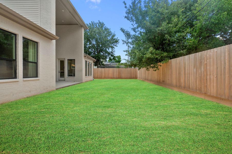 Exterior details and patio area of a home in , Houston (Image 28). Exterior details and patio area of a home in , Houston (Image 28).