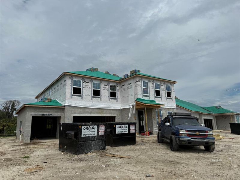 In-progress construction of a new home in Oakfield Trails Signature, Parrish, FL (Image 22).