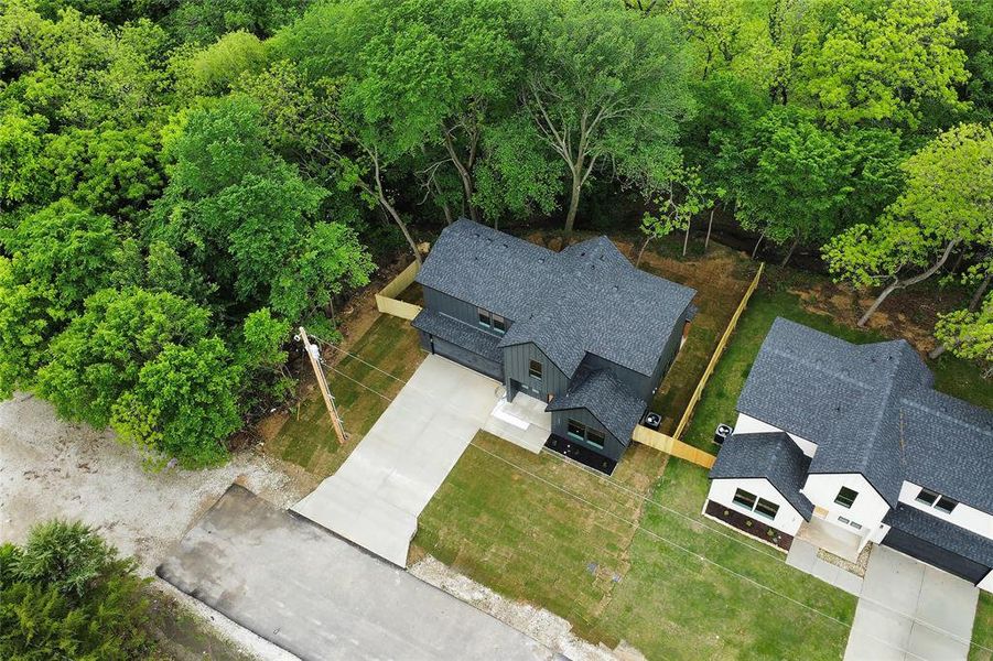 Front exterior of a new home in , Glenn Heights, TX, highlighting curb appeal (Image 23).