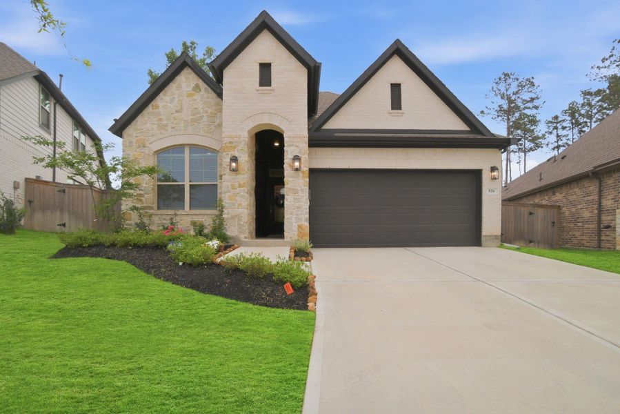 Front exterior of a new home in , Willis, TX, highlighting curb appeal (Image 21).