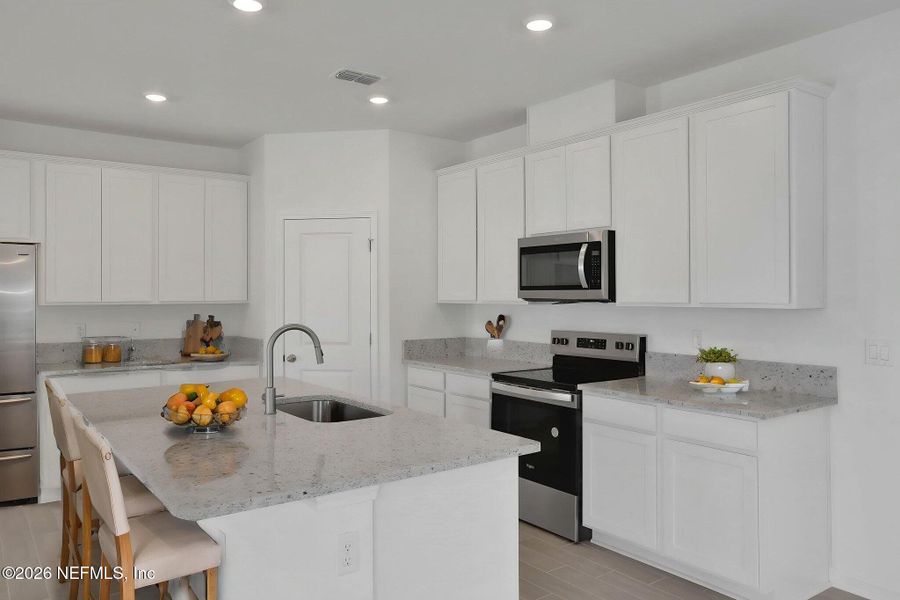 Furnished interior view inside a new home in Amberly, Green Cove Springs (Image 14).