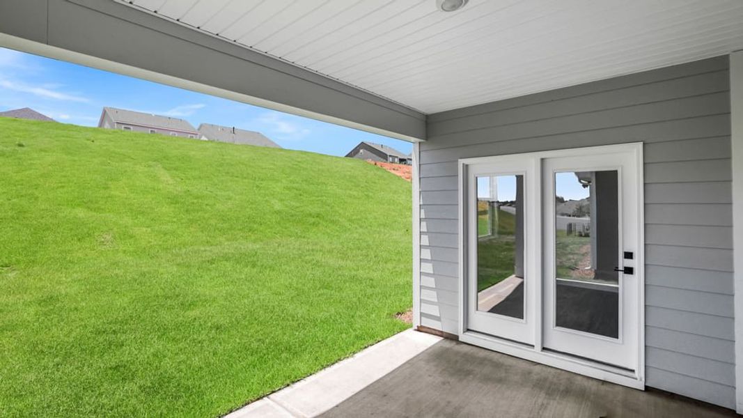 Exterior details and patio area of a home in Whitehawk Meadows, Travelers Rest (Image 3). Exterior details and patio area of a home in Whitehawk Meadows, Travelers Rest (Image 3).