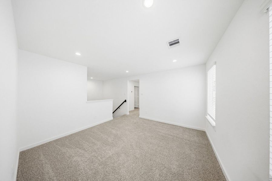 2nd floor flex room, perfect for game room, office space, 2nd living area, the possibilities are endless
