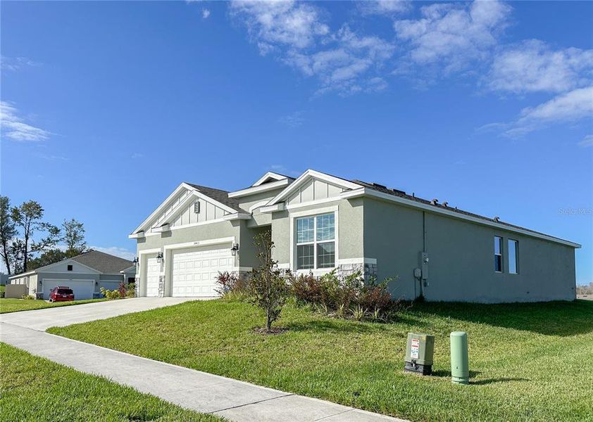 Front exterior of a new home in , Winter Garden, FL, highlighting curb appeal (Image 20).