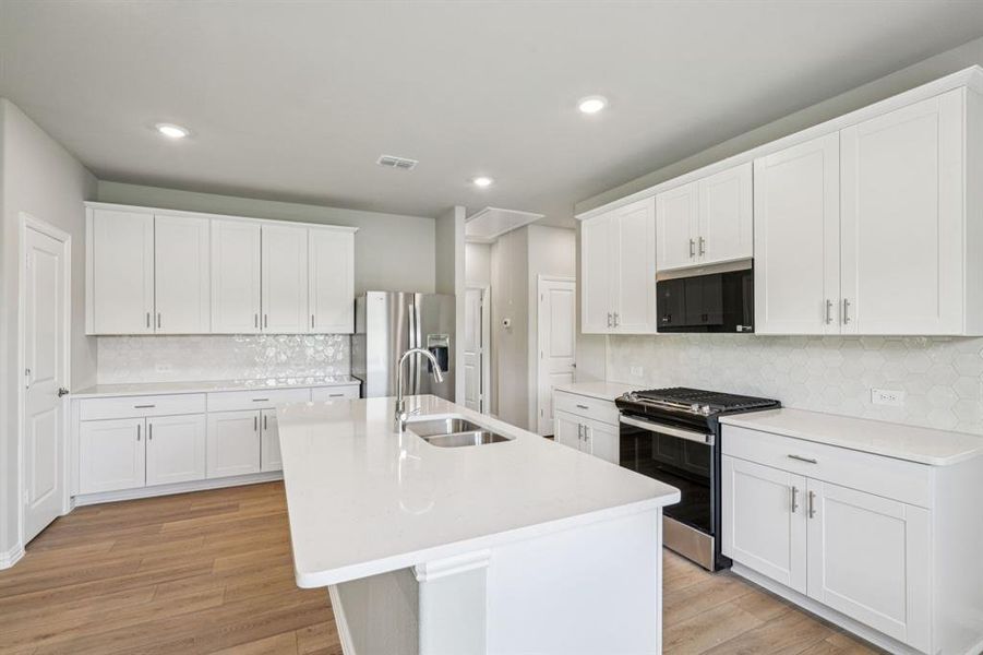 Photo is not of the actual home, but is an inspirational photo of builder’s model home and may depict options, furnishings, and/or decorator features that are not included.