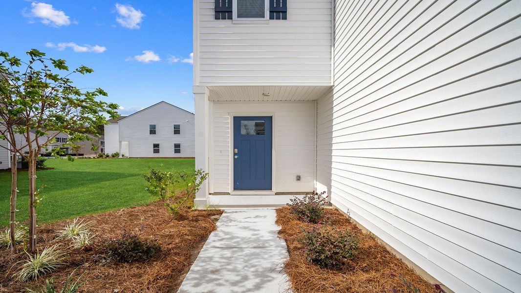 Exterior details and patio area of a home in Longleaf Village, Rincon (Image 2).