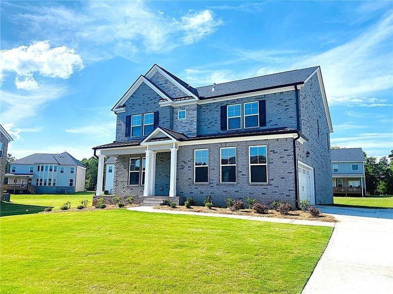 Front exterior of a new home in Westland, Bogart, GA, highlighting curb appeal (Image 22).