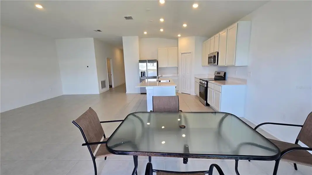 Furnished interior view inside a new home in , Kissimmee (Image 5).