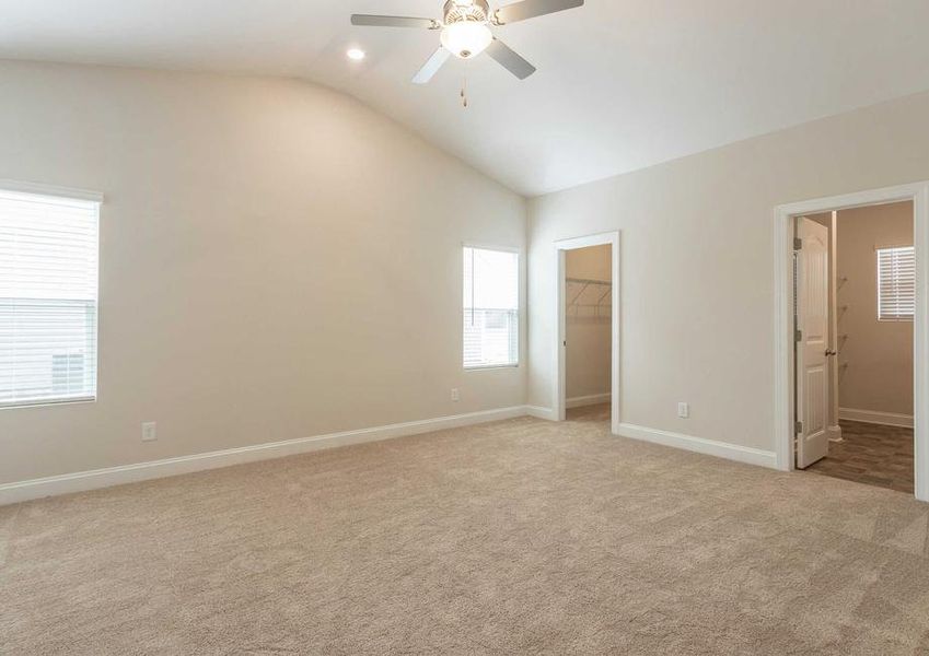 Alexander master bedroom with vaulted ceilings, ceiling fan/lights, and large windows