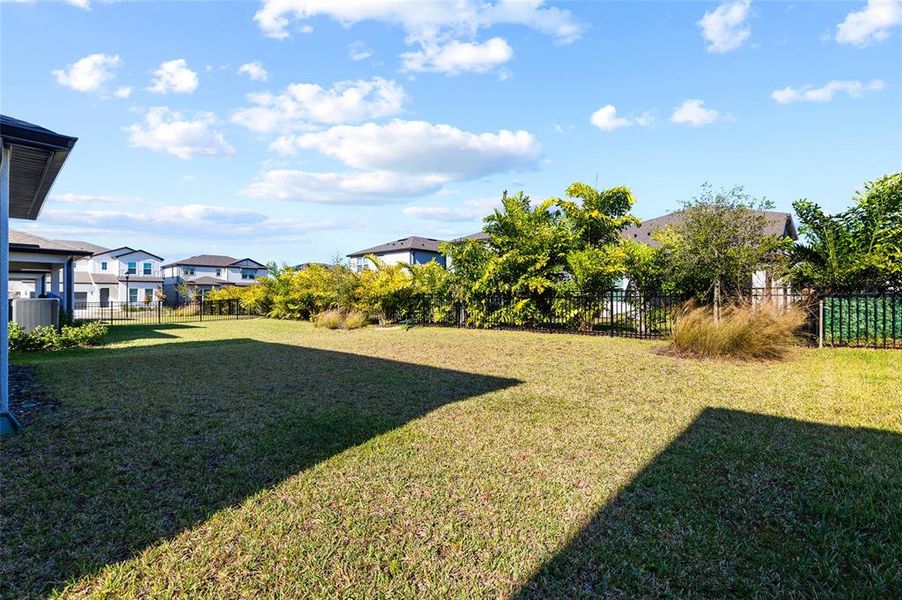 Exterior details and patio area of a home in Waterset, Apollo Beach (Image 29).