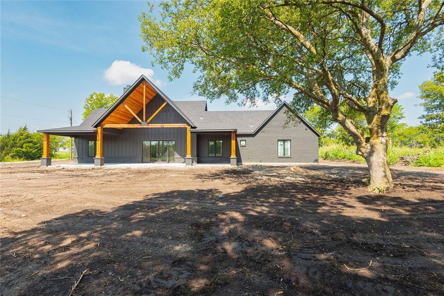 Front exterior of a new home in , Celeste, TX, highlighting curb appeal (Image 12).