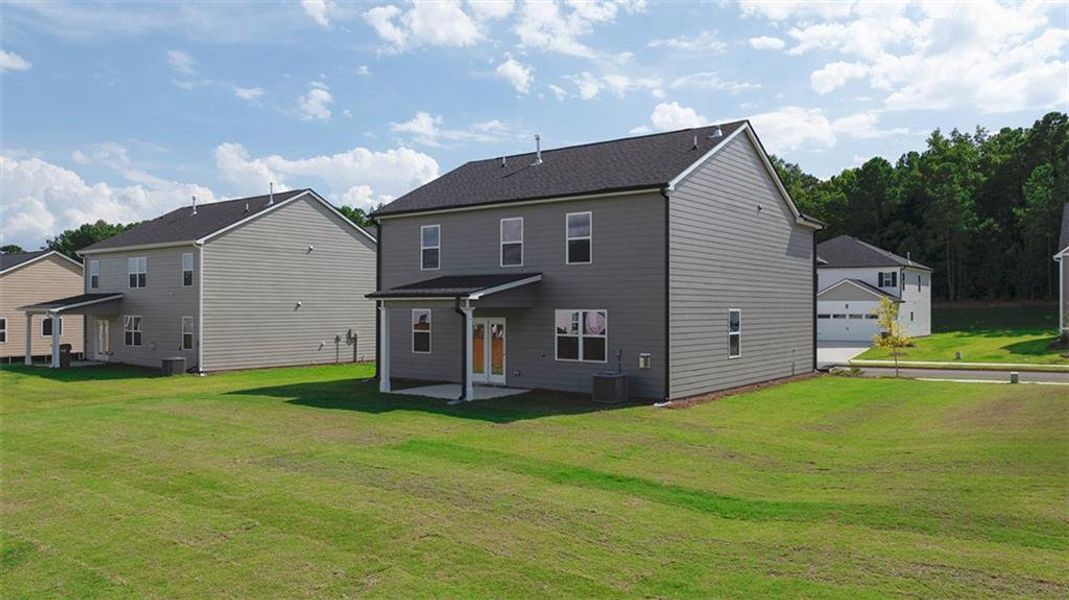 Exterior details and patio area of a home in Jackson Landing, Jefferson (Image 24).