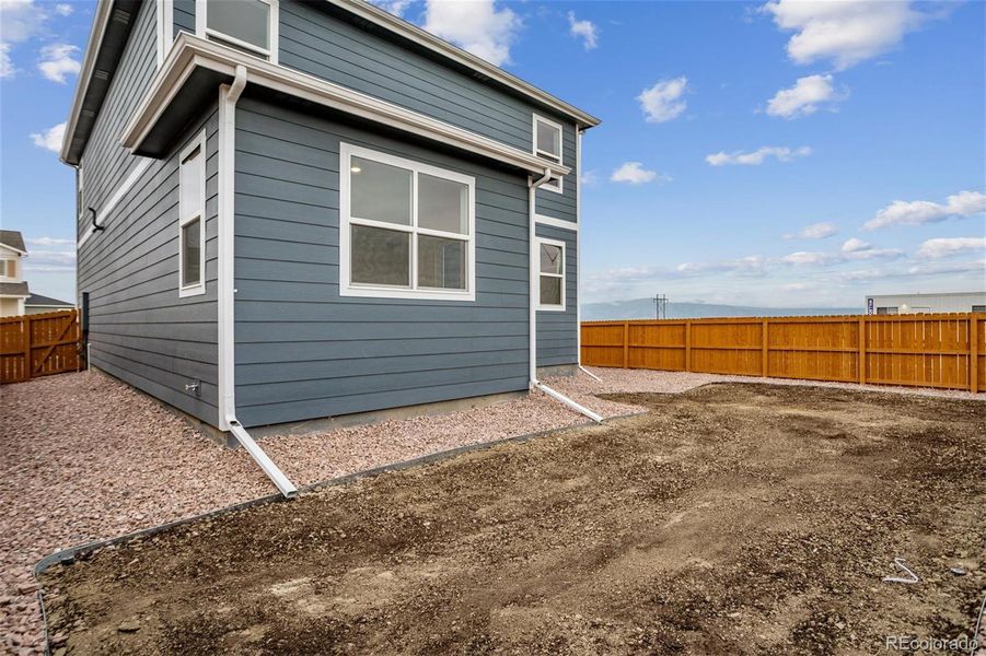 Exterior details and patio area of a home in The Ridge at Lorson Ranch, Colorado Springs (Image 24).